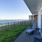 Lush Apartment With Water Views